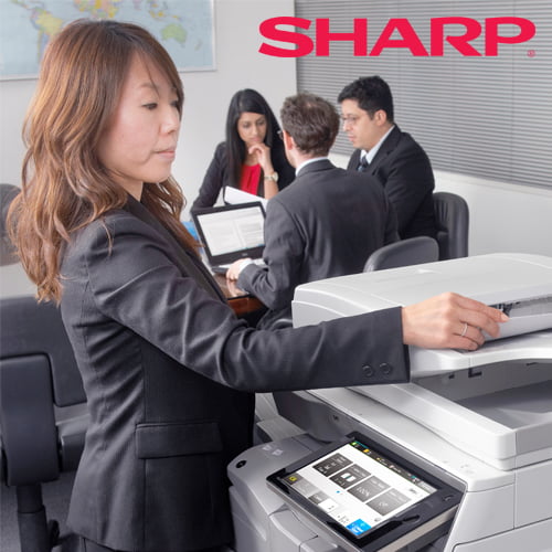 Sharp image of an employee using a Sharp Multifunction Printer