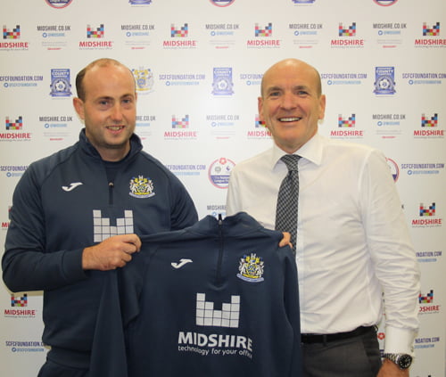 Dave Wardle, Manager at Stockport County Community Foundation, with Midshire Managing Director Julian Stafford
