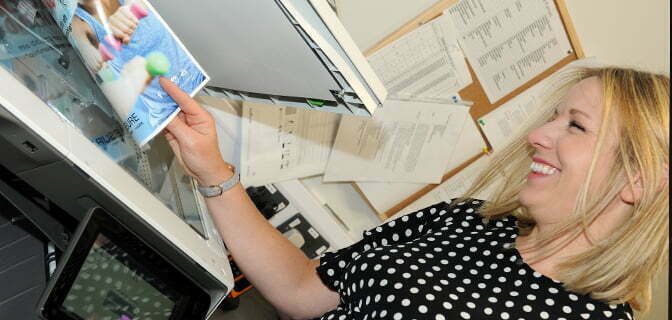 Life Leisure staff using a Midshire photocopier